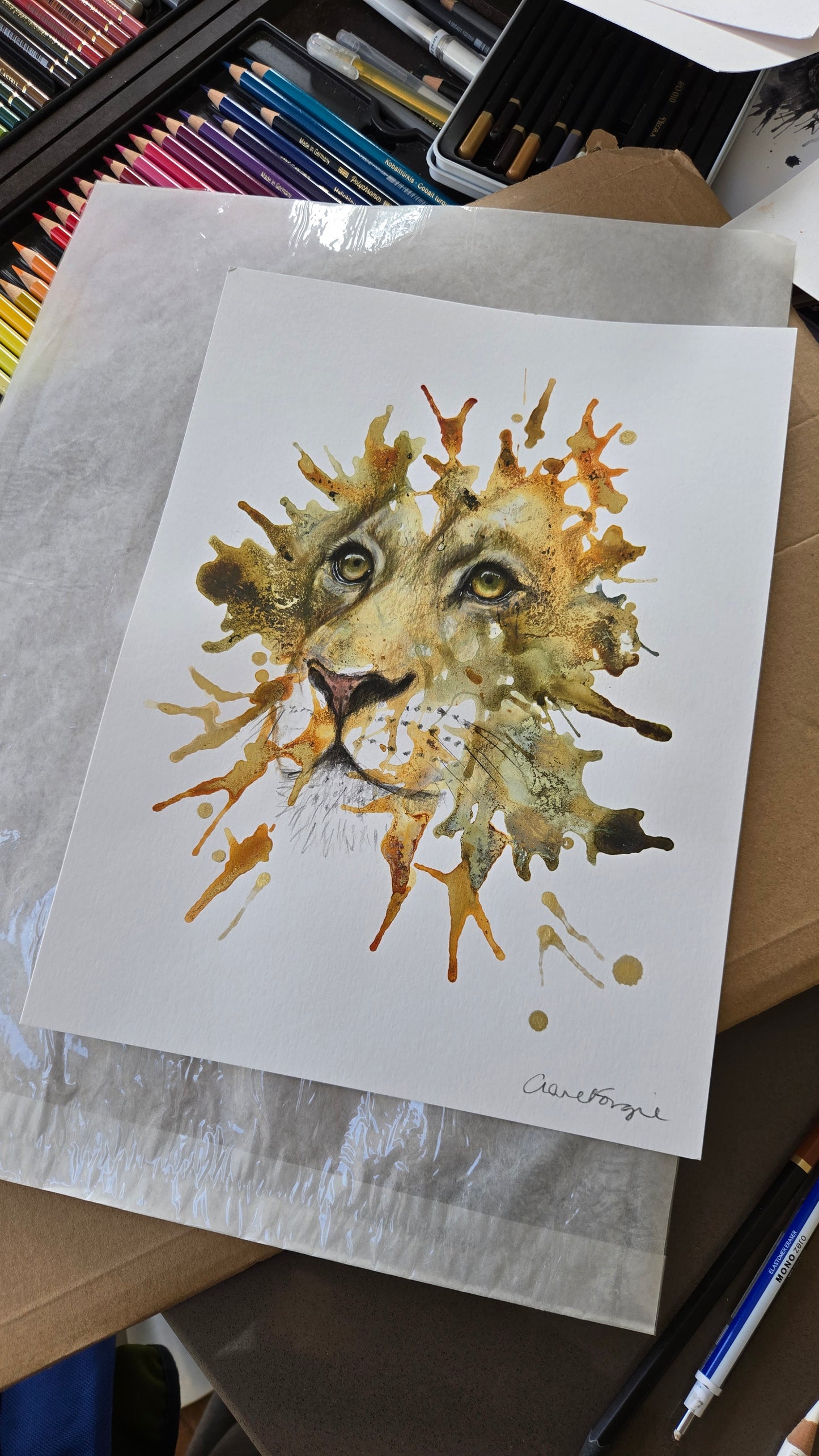 Abstract depiction of a lion's face with beautiful and realistic eyes. Giclée print that is hand-finished using gold ink.