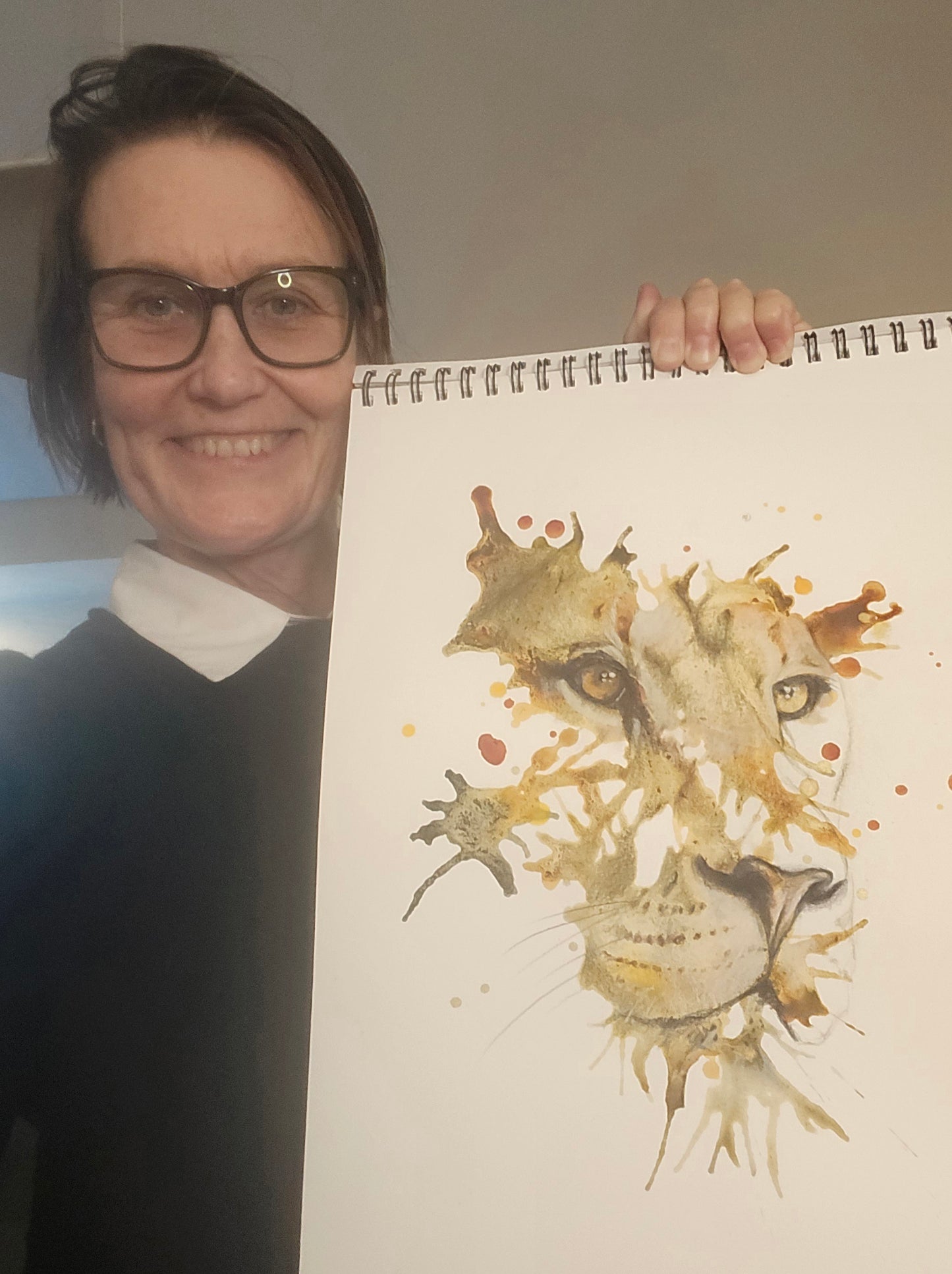 See Clare Forgie with her finished artwork of a lion.